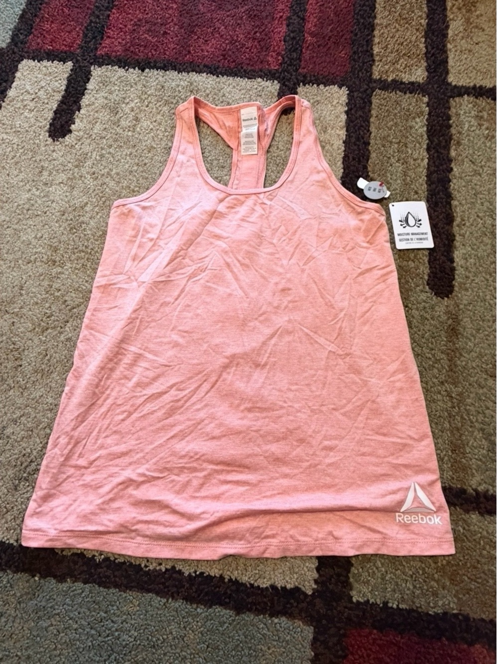 Reebok Women’s Light Pink Racerback Tank Top